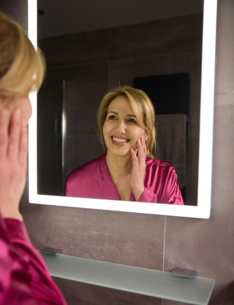 Laura Dowling fabulous pharmacist smiling in the mirror